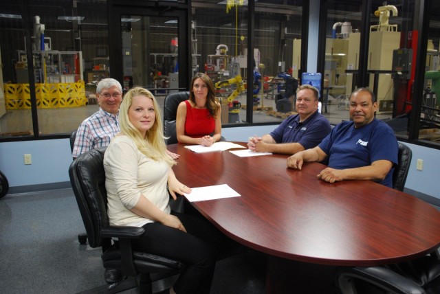 Guyson C-BIG Committee members at one of their first meetings, clockwise from front left, are Caitlin Lewis, John Carson, Megean Mincher, Ashley Cooper and Kevin Long.