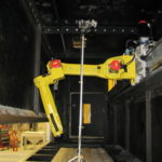 Custom Robot-On-Rail Blasting and Shot Peening System for Aerospace Industry