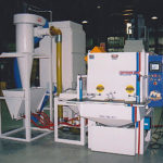 This large machine includes 6 blasting guns that blast the product through multiple process chambers.