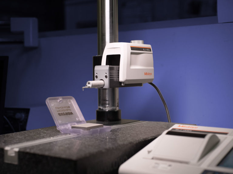 using a Guyson Non-periodic specimen gauge with a profilometer will confirm the accuracy of your blast finish